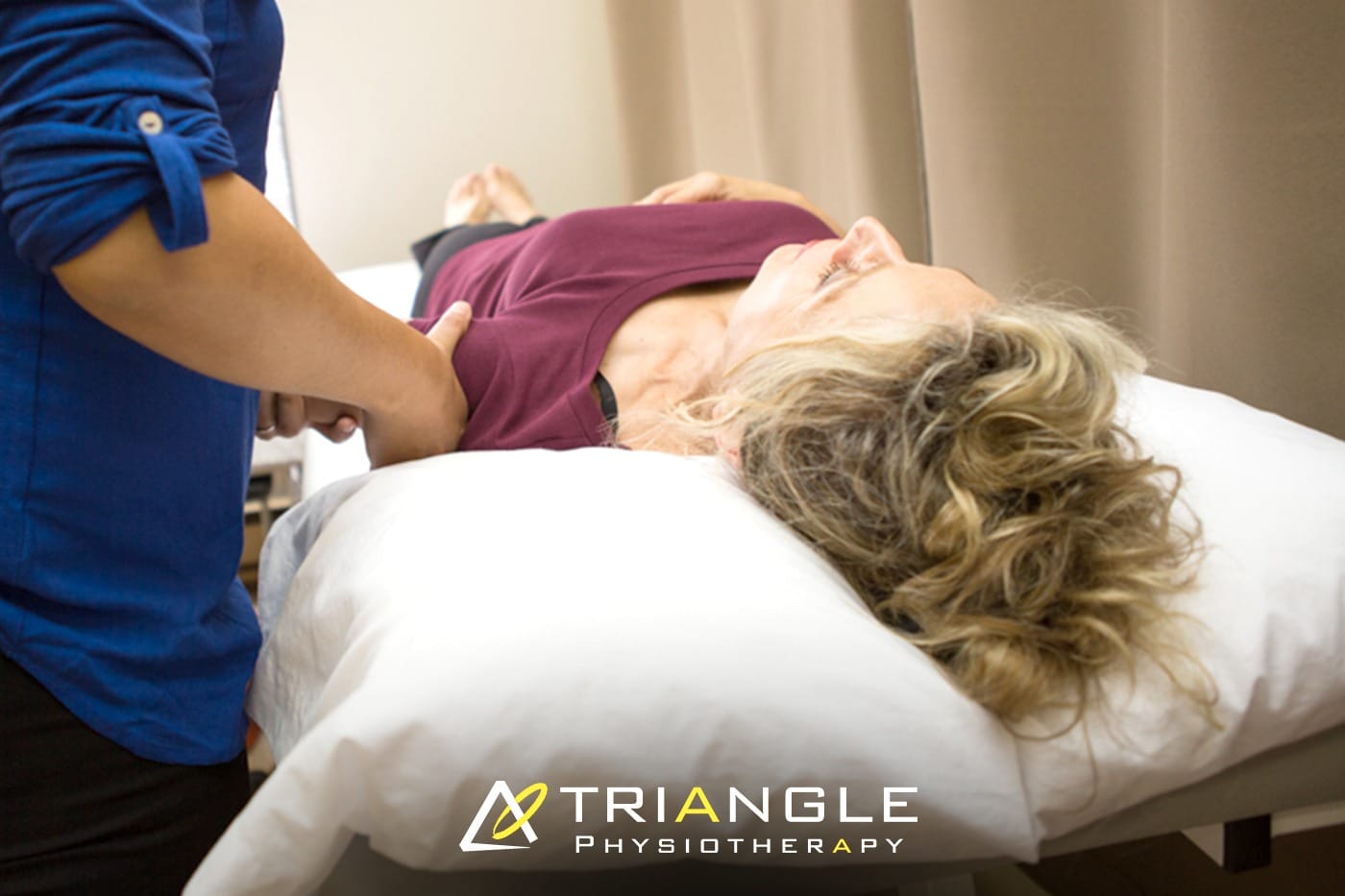Patient receiving first physiotherapy assessment with therapist guidance