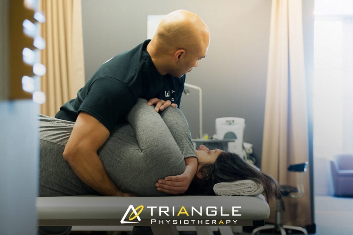 Chronic back pain treatment plan discussion between physiotherapist and patient