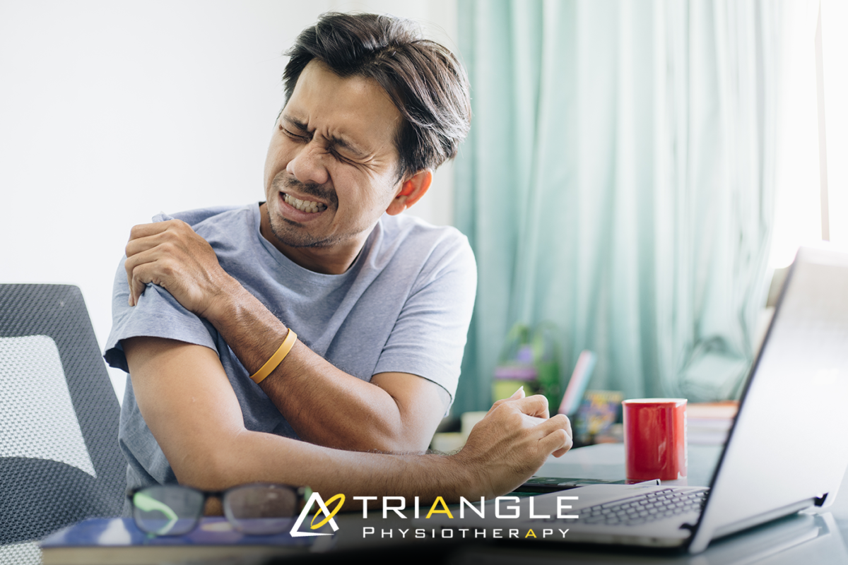 Physiotherapist helping a patient with joint pain treatment at Triangle Physiotherapy Oakville